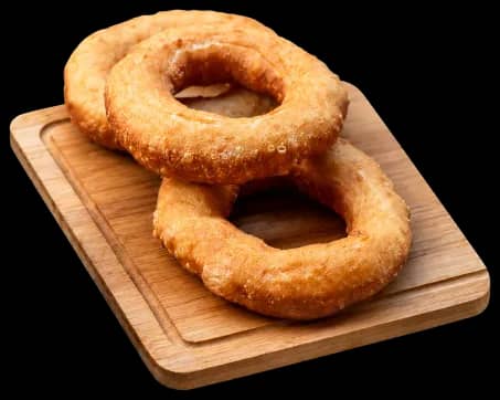 Warm sesame simit on a wooden board
